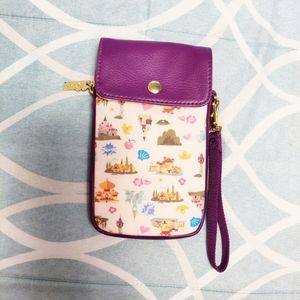 Disney Wristlet with zipper and button closure.